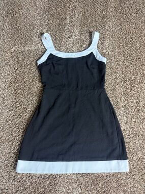 Lulu's Black Mini Dress with White Trim and Pockets
